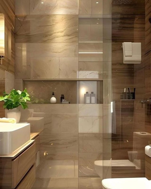 Detalle de baño con porcelanato, madera, cancel de cristal y grifería